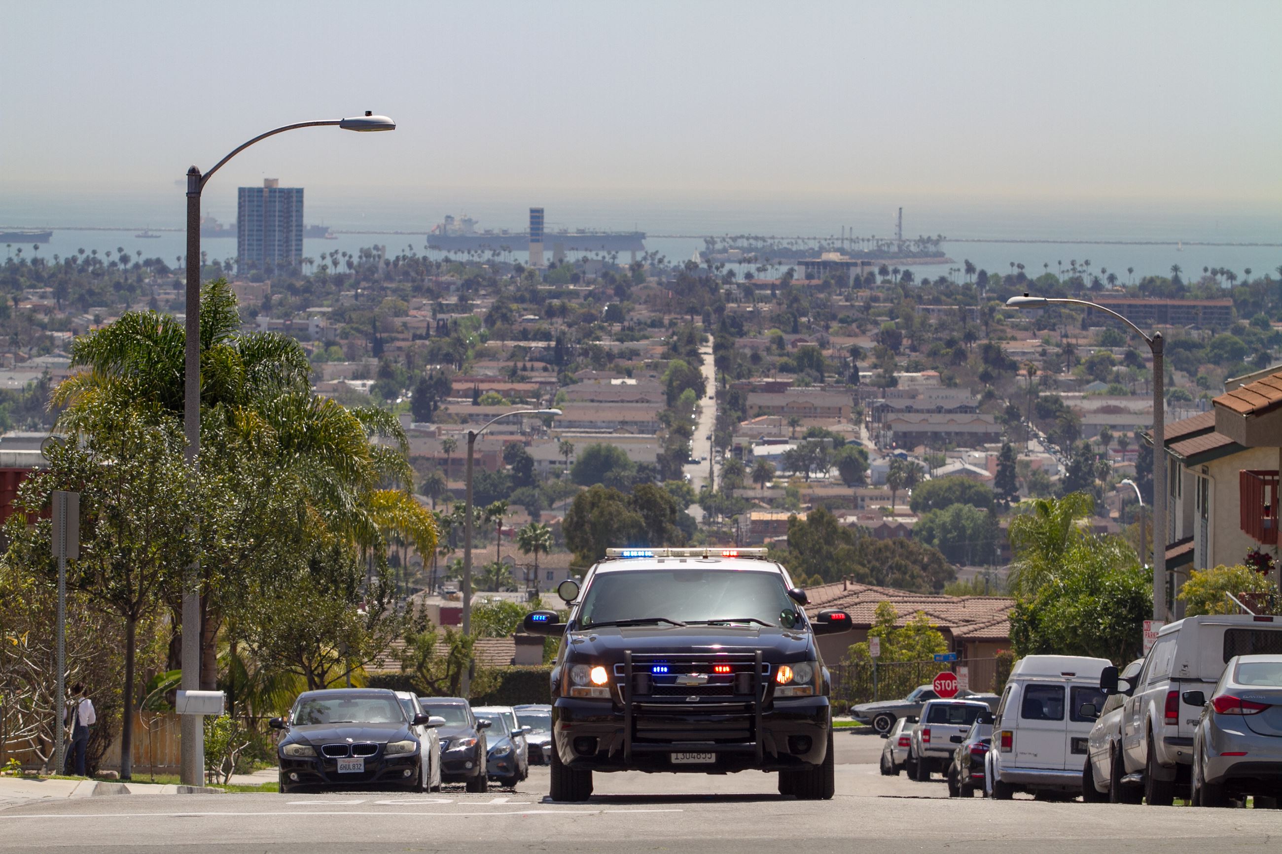 Police Car At Hilltop Lights On