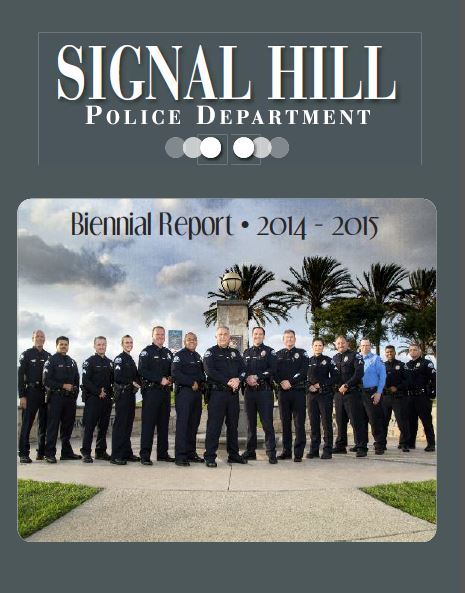 The cover of the 2015-2016 Biennial Report featuring officers posing