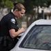 Officer talking to the driver of a car